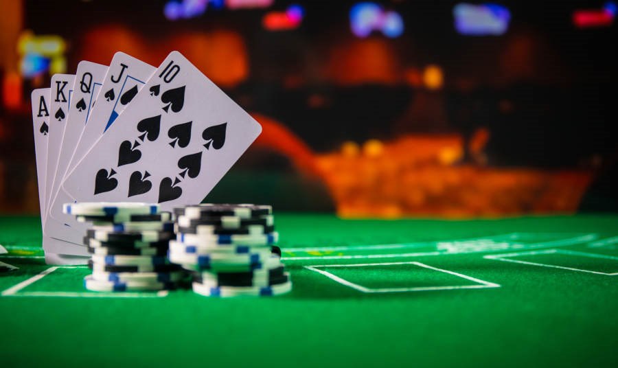 Playing cards and poker chips on a casino table