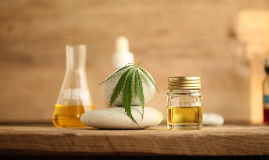 CBD bottle and Massage Stones