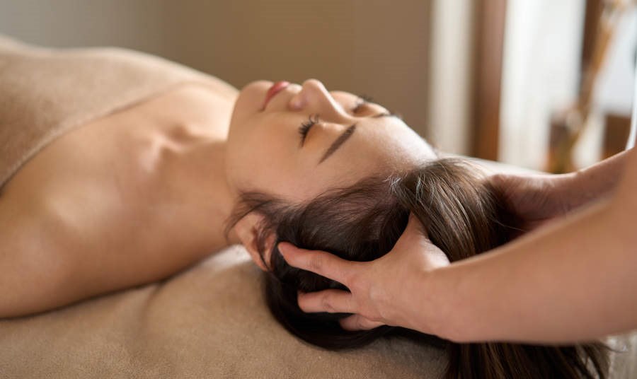 Women getting a head spa treatment