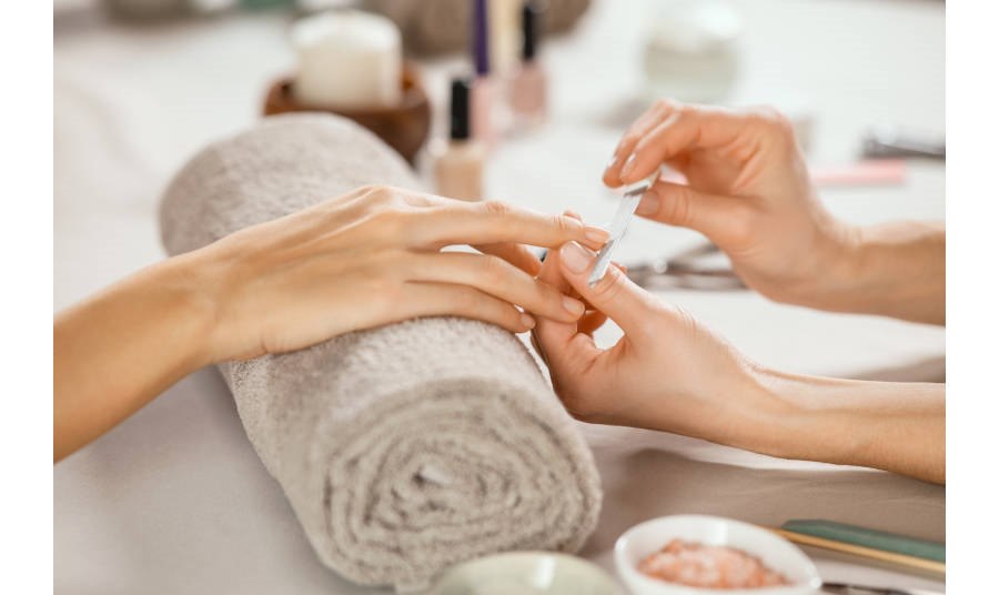 Women getting a manicure in a spa