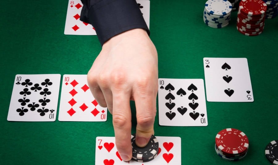 hand on the table shows the addition of chips to the player with the winning combination of cards