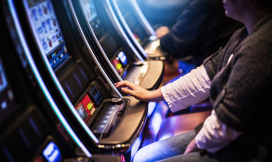 Close up of a man at a Slot Machine