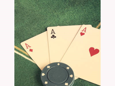 3 cards and a poker chip