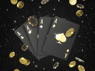 Playing cards aces and falling golden coin and poker chips