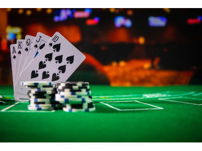 cards and chips on a casino table 