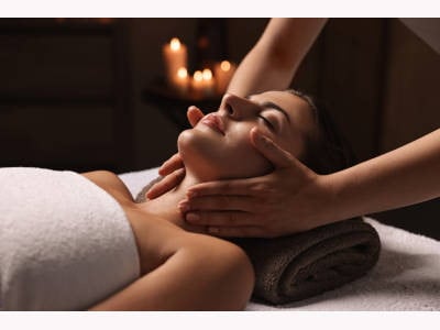 Close up of a women getting a facial massage